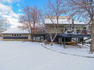 South facing Deck and entry door to lower level apartment-access from garage mandoor.