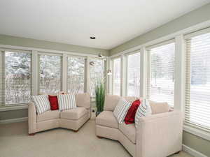 Living area features an abundance of sunlight
