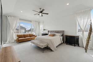 Carpeted bedroom with recessed lighting and ceiling fan