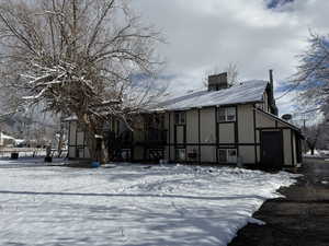View of front of home featuring stucco siding