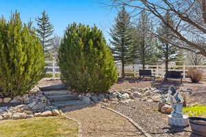 View of yard with fence