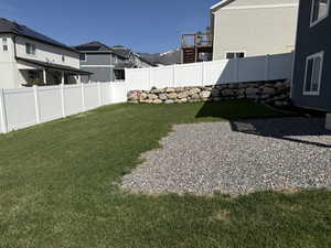 View of yard with fence