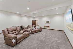 Living room featuring recessed lighting and carpet floors