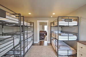 Bunk room,  with recessed lighting, baseboards, and wood finished floors