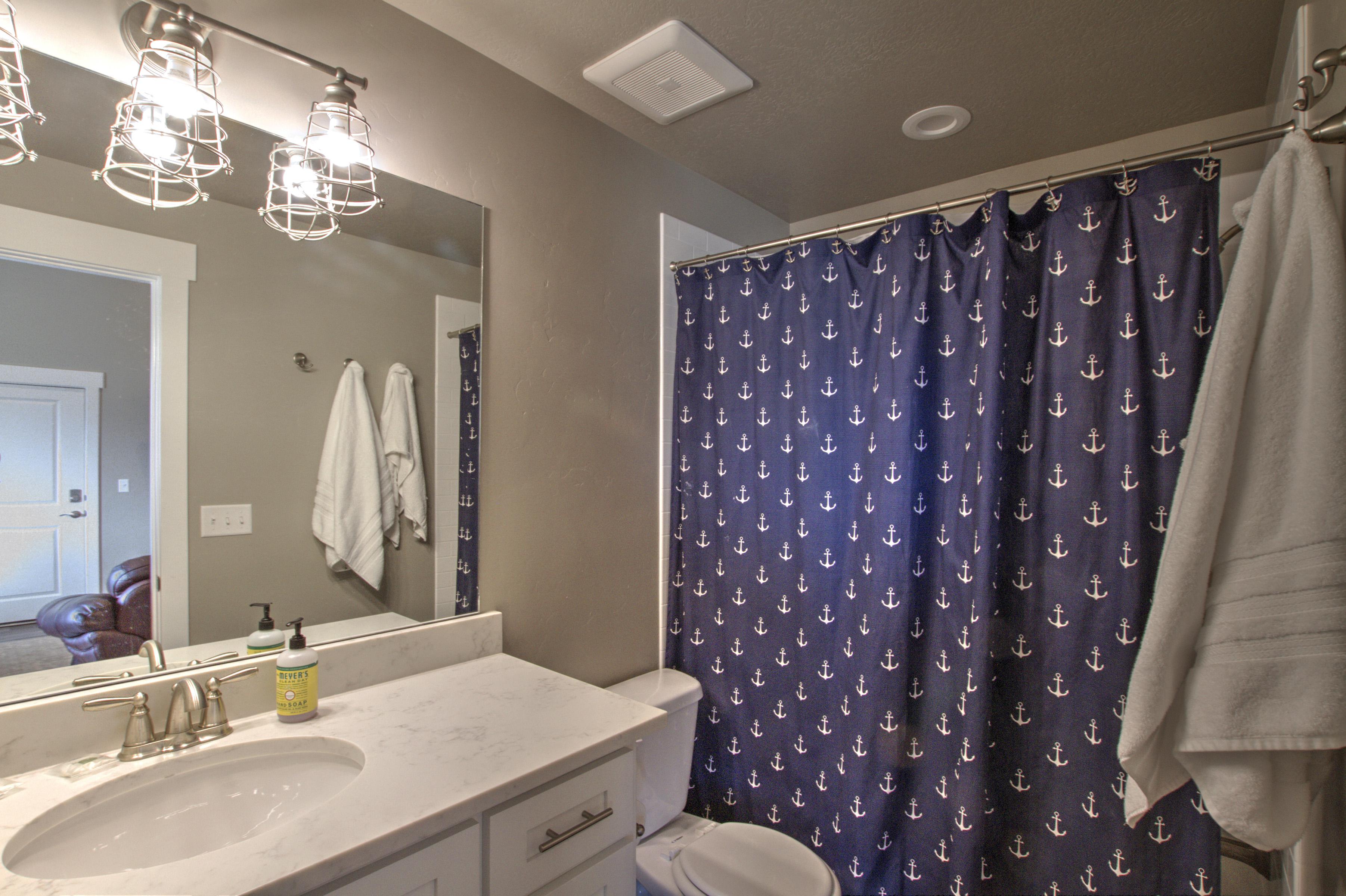 Full bathroom featuring, connected bathroom, toilet, and vanity