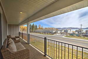 Balcony with a mountain view and a residential view