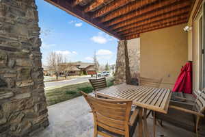 View of patio with outdoor dining area