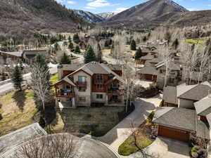 Aerial view featuring a mountain view and a residential view