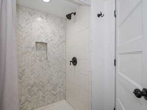 Bathroom with a tile shower