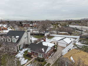 Snowy aerial view with a residential view