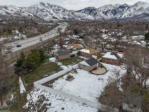 Snowy aerial view with a mountain view