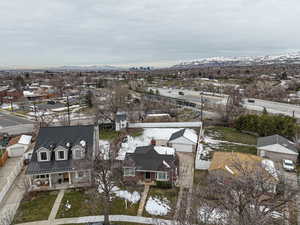 Drone / aerial view featuring a mountain view and a residential view