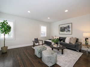Living room featuring recessed lighting, baseboards, and wood finished floors