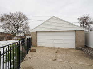 Detached garage with fence
