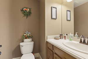 1/2 bathroom by the garage