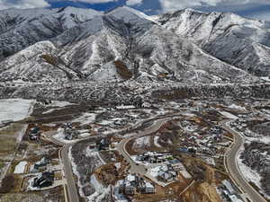 Snowy aerial view featuring a mountain view