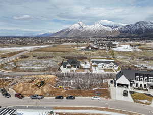 Property view of mountains with a residential view