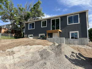 View of front facade with stucco siding