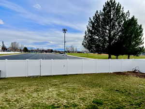 View of yard with fence
