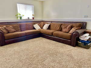Living area with carpet floors