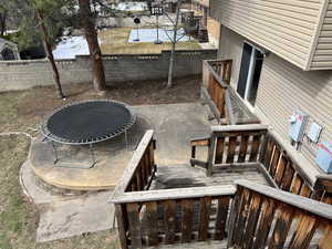 View of patio / terrace with stairs and fence
