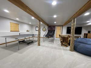 Playroom featuring beamed ceiling, recessed lighting, baseboards, and carpet floors