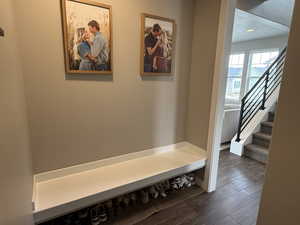 Mudroom with dark wood-style floors