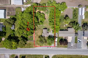 Aerial overview of property's location featuring property boundaries highlighted