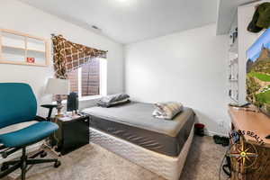 bedroom 7 featuring visible vents, baseboards, and a textured ceiling