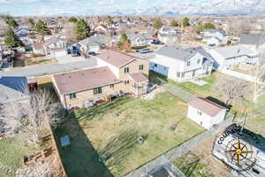 Drone / aerial view featuring a residential view and a mountain view