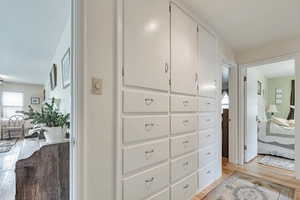 Many inset drawers and cabinets throughout home