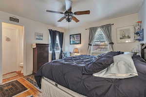 Bedroom #1 another view featuring two windows