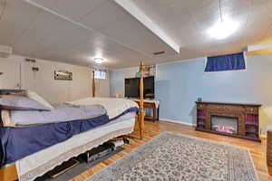 Basement family room currently used as a bedroom