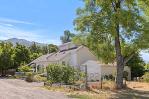 View of property exterior with a mountain view