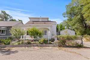 Dutch home with stucco siding