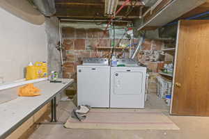 Laundry room with included washer and dryer