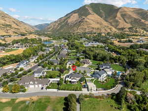 Aerial view with a residential view and a water and mountain view