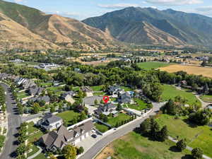 Aerial view featuring a residential view and a mountain view