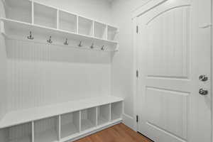Mudroom with wood finished floors