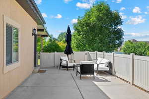 View of patio featuring a fenced backyard