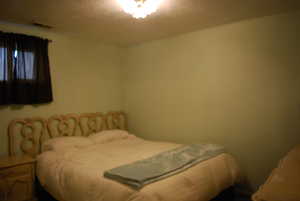 Bedroom with visible vents