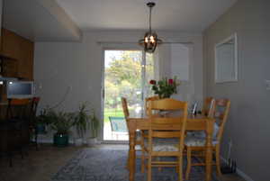 Dining space with a notable chandelier