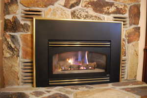 Room details featuring a glass covered fireplace