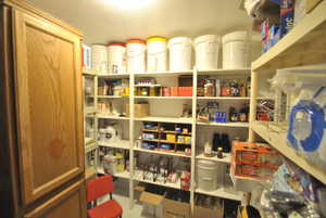 View of basement storage room connected to the family room.  This is 1 of several large storage spaces throughout the property.