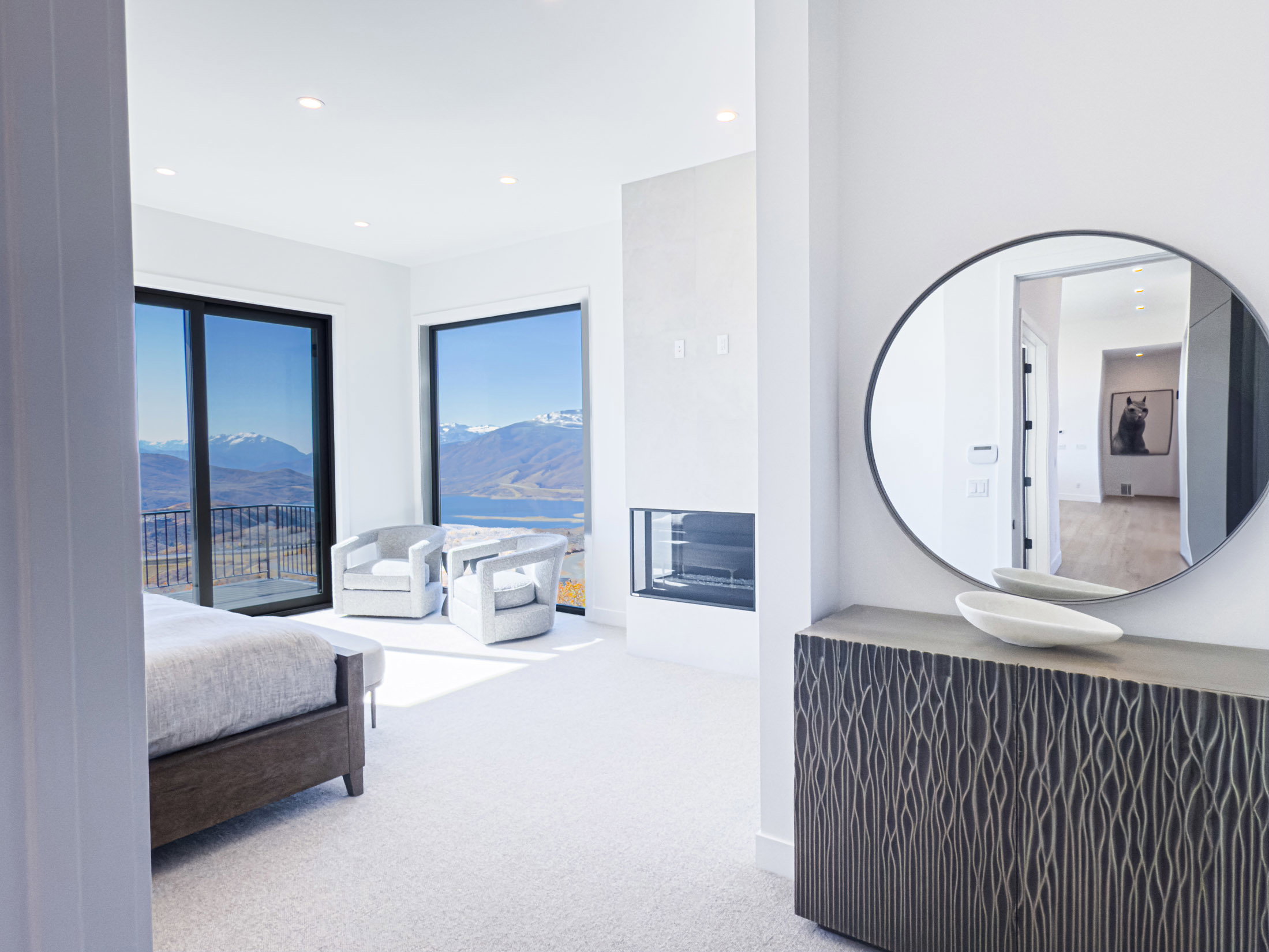 Bedroom with carpet floors, recessed lighting, and a mountain view