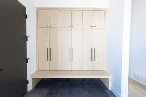 Mudroom featuring visible vents