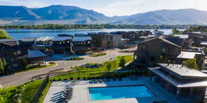 Aerial view of a mountainous background and a pool area