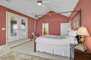 Bedroom with visible vents, carpet, vaulted ceiling, french doors, and access to outside