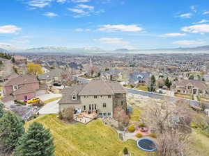 Bird's eye view featuring a mountain view and a residential view
