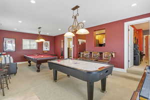 Rec room with recessed lighting, baseboards, light colored carpet, and billiards